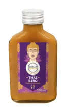 Bouteille de sauce piquante Shilly Shally Thai Bird, 100ml, au goût fruité et pimenté, étiquette violette avec motif exotique.