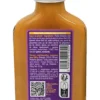 Bouteille de sauce piquante avec étiquette détaillant ingrédients, valeurs nutritionnelles et code QR pour recettes.