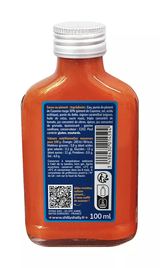 Bouteille de sauce au piment avec étiquette indiquant ingrédients et informations nutritionnelles, 100 ml.