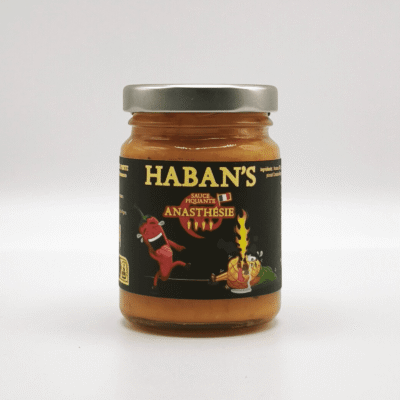 Pot de sauce piquante Haban's Anasthésie, étiquette noire avec un piment rouge et une flamme.
