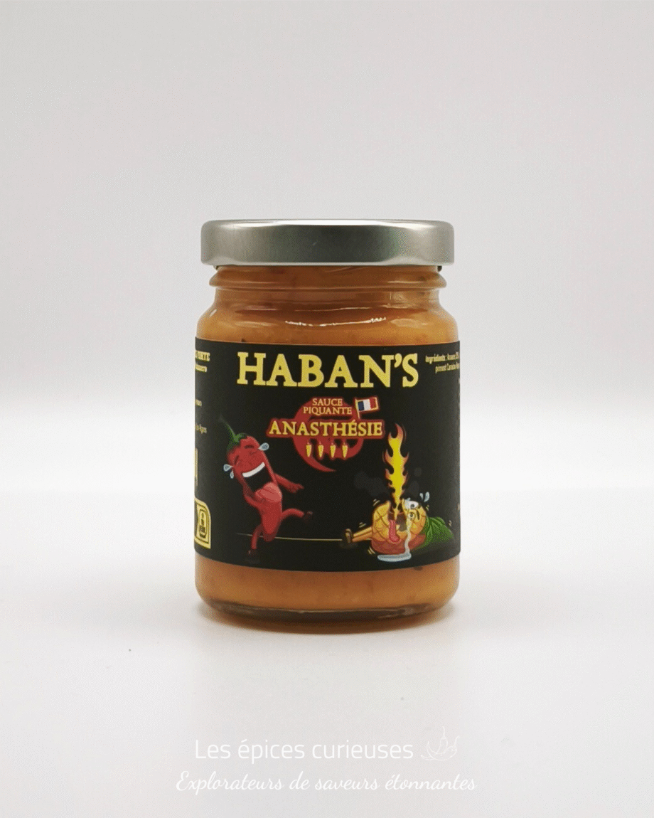 Pot de sauce piquante Haban's Anasthésie, étiquette noire avec un piment rouge et une flamme.