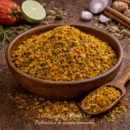 Mélange coloré d'épices dans un bol en bois sur fond rustique, prêt à rehausser vos plats culinaires.