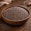 Bol de graines de chia sur une table en bois, riches en fibres et oméga-3, parfaites pour une alimentation saine.